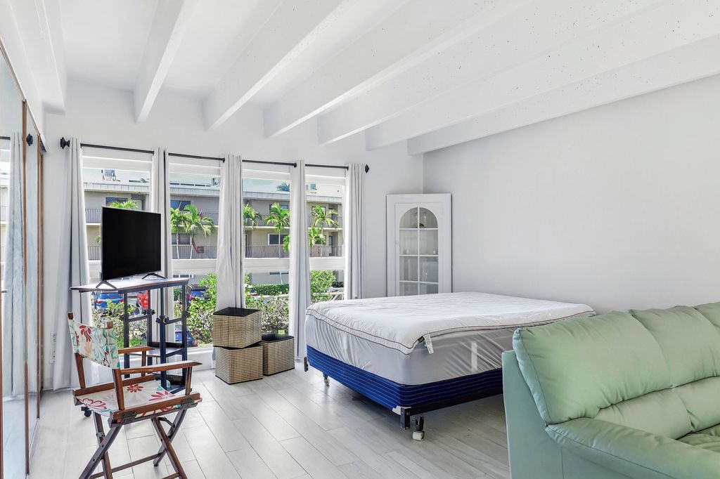 Photo of 4001 S Ocean Boulevard #209, South Palm Beach, FL 33480 (MLS # B26023354)