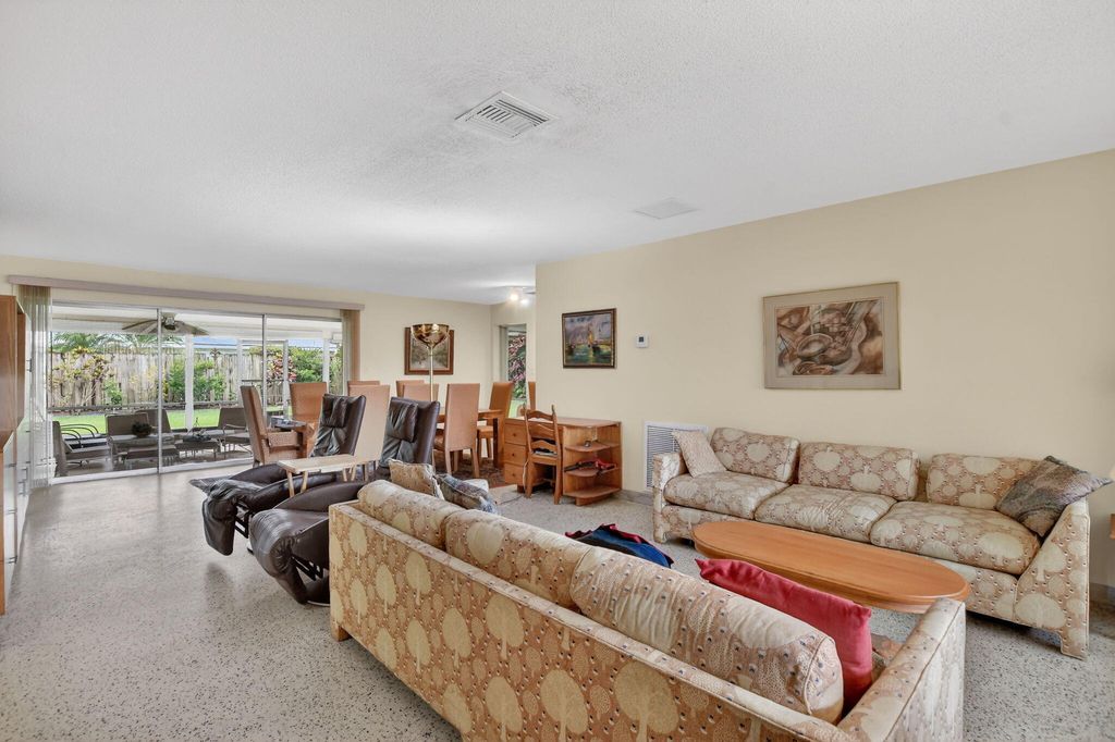 Photo of 1060 NW 4th Street, Boca Raton, FL 33486 (MLS # B26002535)