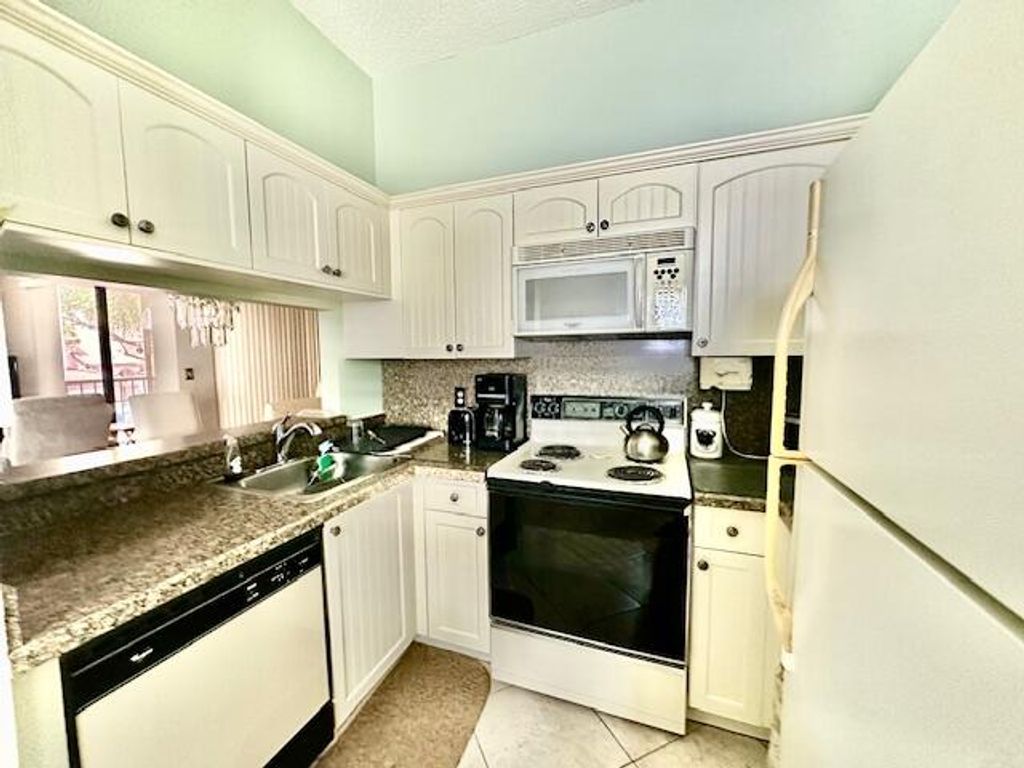 Photo of 5430 Venetia Court #N, Boynton Beach, FL 33437 (MLS # B26010323)