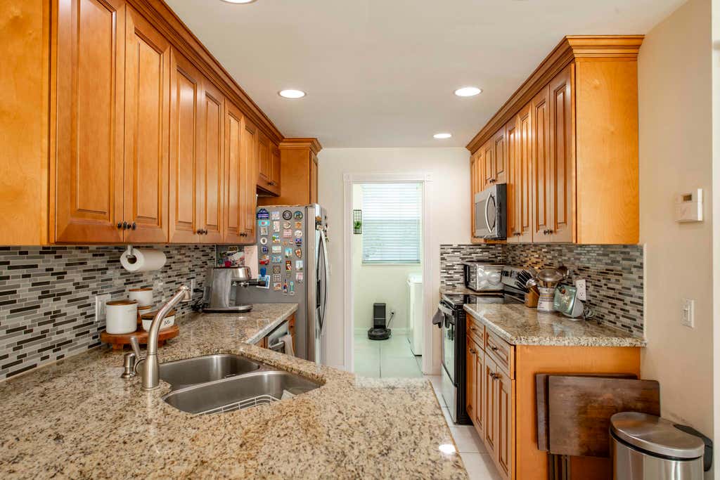Photo of 154 SANTA BARBARA Way, Palm Beach Gardens, FL 33410 (MLS # B26065176)