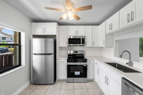 Photo of 5162 Tennis Lane, Delray Beach, FL 33484 (MLS # B26041744)