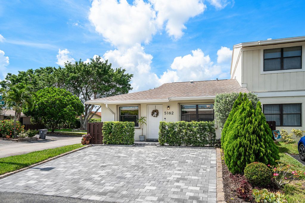 Photo of 5162 Tennis Lane, Delray Beach, FL 33484 (MLS # B26041744)