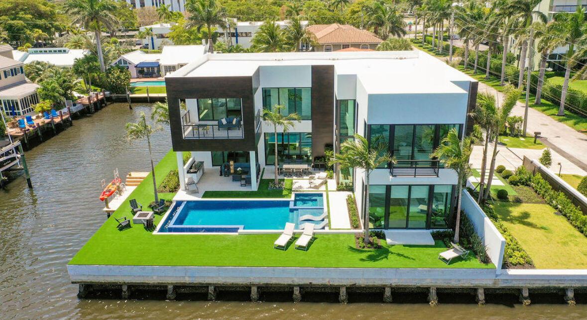 Experience luxury living at this exquisite 5-bedroom, 5-bathroom residence on a spacious corner lot in Delray Beach. With direct intracoastal water views, this fully furnished rental offers an unparalleled lifestyle. The contemporary design is complemented by a private terrace and yard, perfect for enjoying the serene surroundings. The home boasts a private pool, ideal for relaxation and entertaining. A private garage adds convenience and security. This elegant property is situated on 6106 square feet, providing ample space for comfortable living. Embrace the epitome of luxury living in this waterfront retreat, where every detail has been meticulously crafted for the discerning resident. Don't miss the opportunity to make this stunning residence your own.