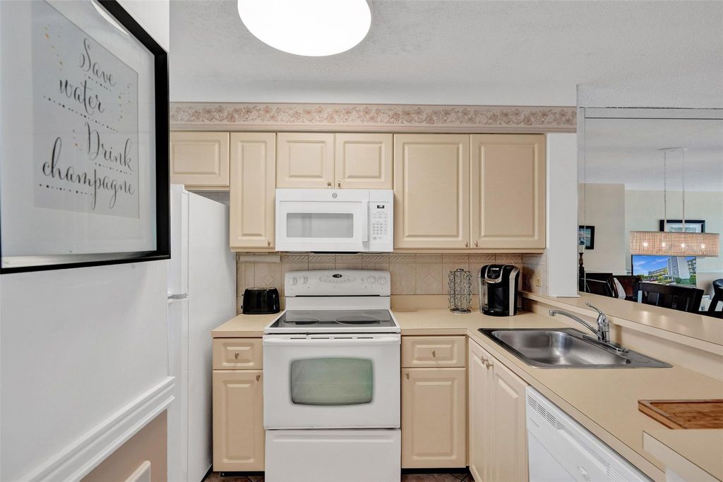 Photo of 2226 N Cypress Bend Drive #109, Pompano Beach, FL 33069 (MLS # F10513529)