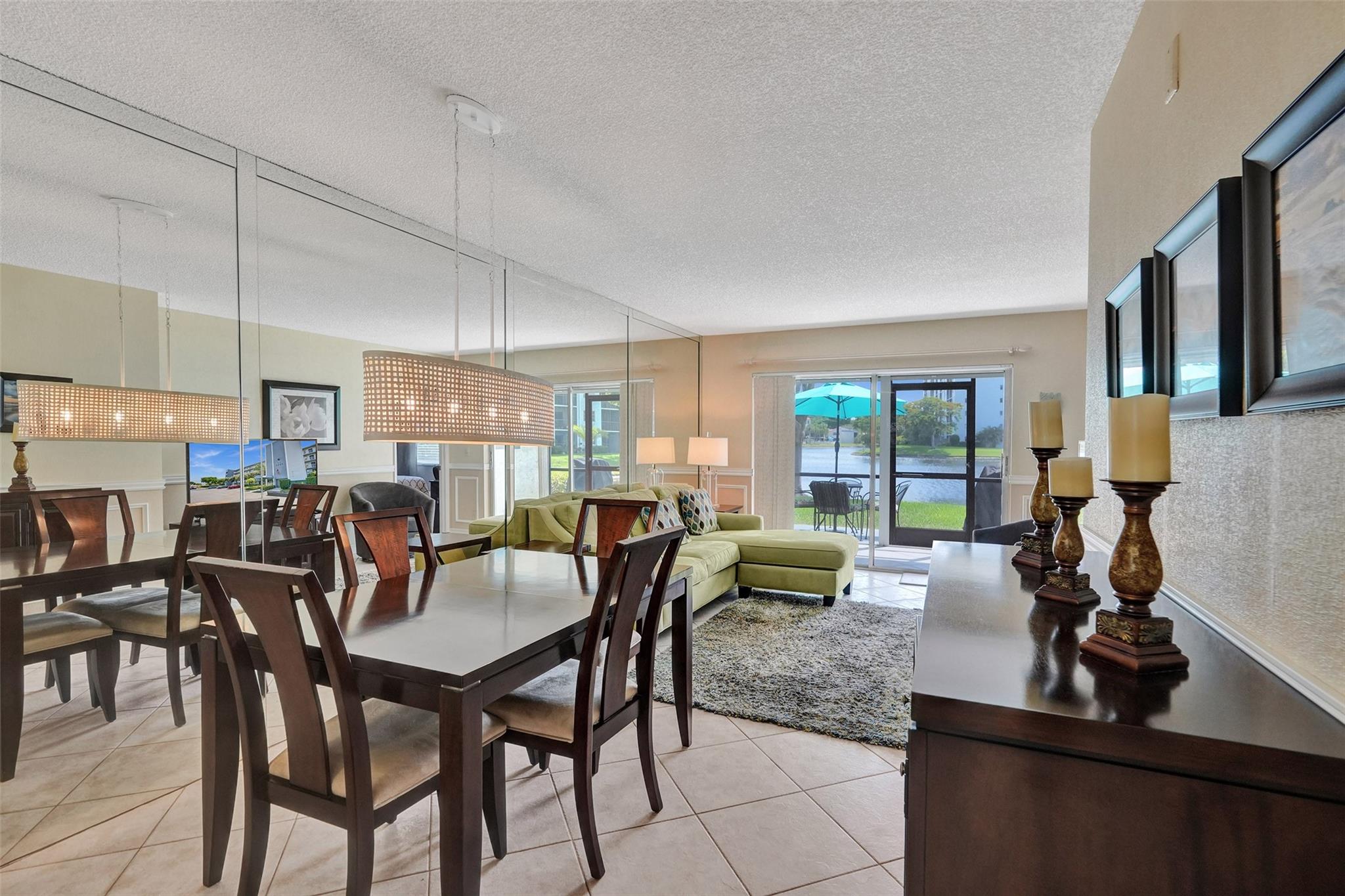 This is an amazing opportunity to purchase this beautiful and well kept 2bed/2bath 1st floor condo with a lake view. Master bedroom features a walk in closet. This condo features a screened in patio. 2nd bedroom has a mini refrigerator in the room. LG washer/dryer within the unit. Enjoy a plethora of amenities including swimming pool, tennis courts, clubhouse with pool table and gym. Includes 1 assigned parking space #11 and plenty of guest spaces. Air conditioner from 5yrs/water heater 2yrs. SMALL PETS ALLOWED! A perfect blend of comfort and convenience awaits you with a tranquil lake view.