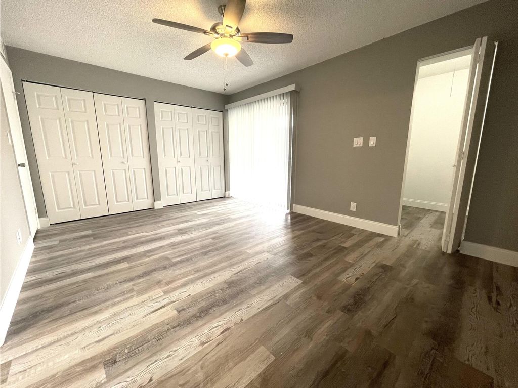 Photo of 700 Village Green Court #319, Palm Springs, FL 33461 (MLS # B26007164)