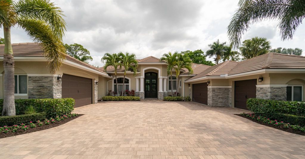 Photo of 1209 Breakers West Boulevard, West Palm Beach, FL 33411 (MLS # R11133180)