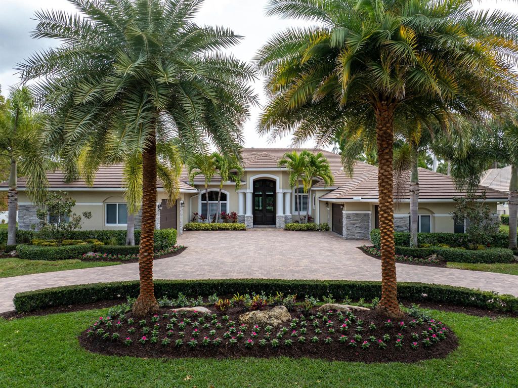 Photo of 1209 Breakers West Boulevard, West Palm Beach, FL 33411 (MLS # R11133180)
