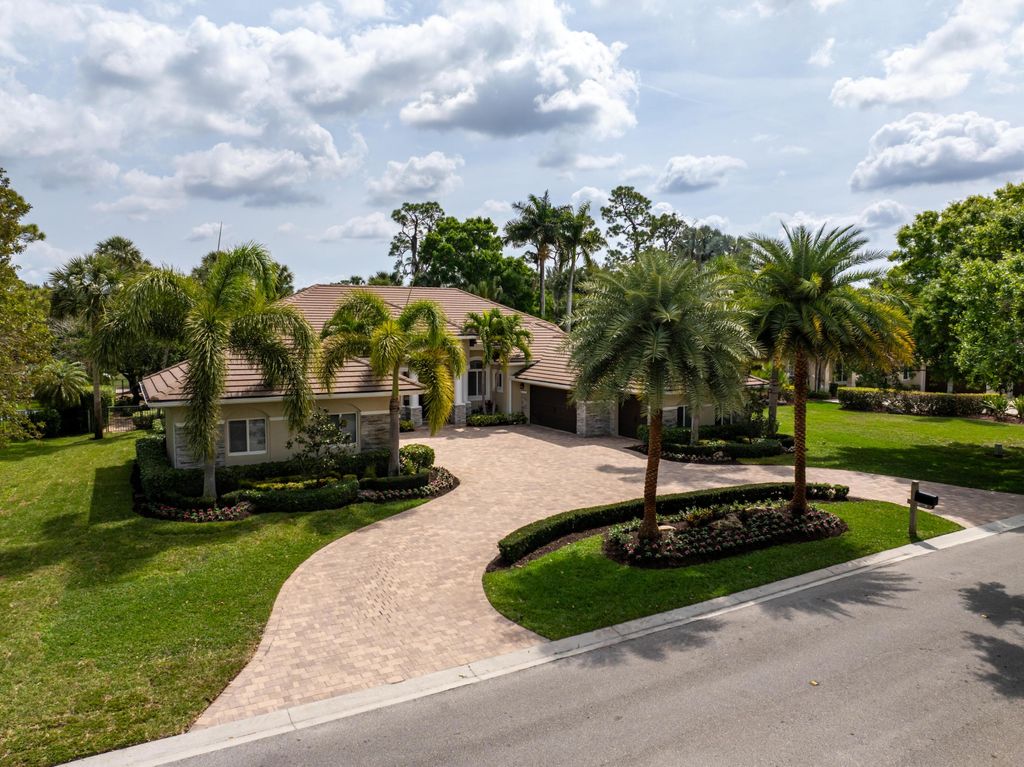 Photo of 1209 Breakers West Boulevard, West Palm Beach, FL 33411 (MLS # R11133180)