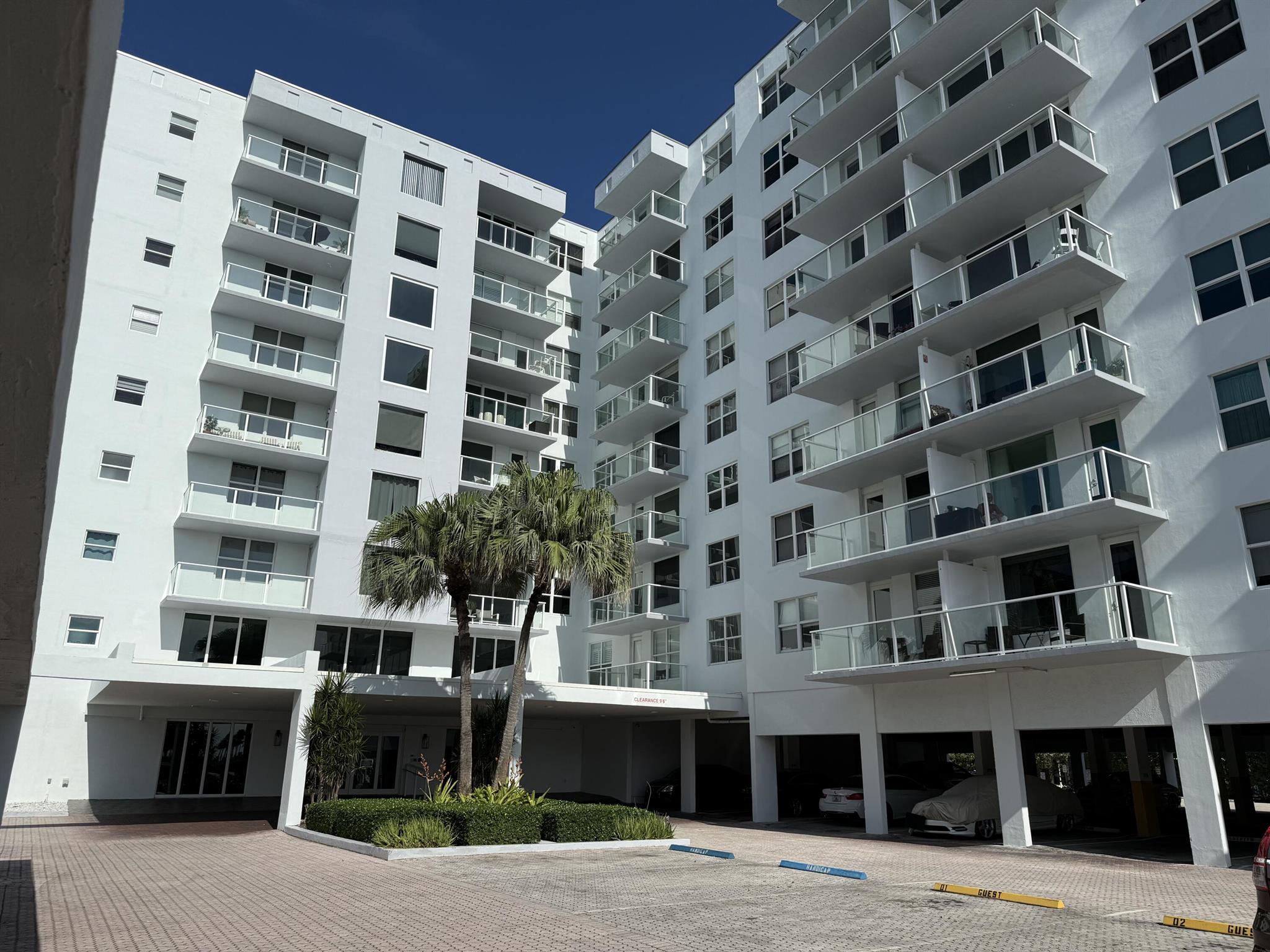 Welcome to this beautiful 3-bedroom,3-bath residents in The Patrician, offering stunning views of the Atlantic Ocean and Intracoastal Waterway. This fully renovated unit includes a rare third bedroom and solid privacy walls off the balcony, providing extra exclusivity. Step inside to find a bright, open living and dining area that flows seamlessly to the balcony--perfect for enjoying sunset views. The unit features modern upgrades, including quartz countertops, stylish bathrooms, and spacious storage with custom closets and luxury vinyl flooring. The living room showcases a custom-built wall unit for added elegance and functionality. This property is equipped with impact windows and doors for your safety and comfort.