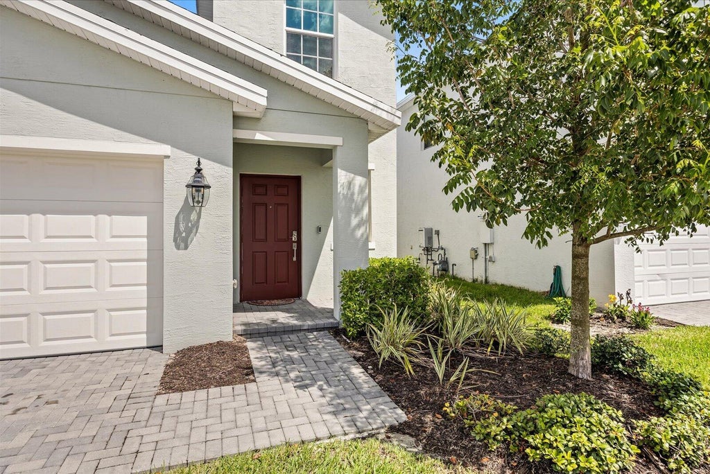 Photo of 11065 NW Pondside Lane, Port Saint Lucie, FL 34987 (MLS # B26076207)