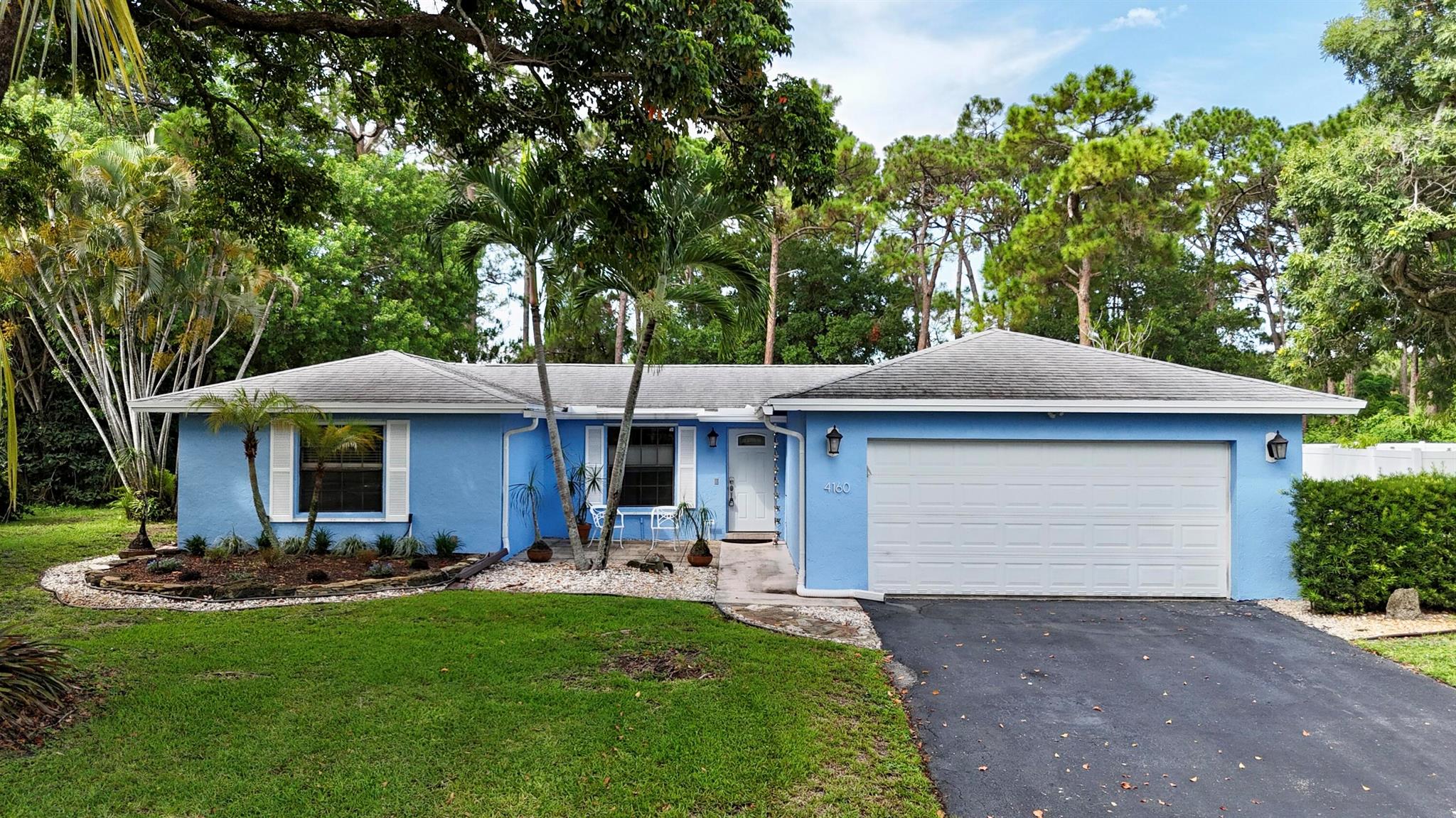 Beautifully updated 2BR/2BA pool home in the desirable Lake Forest South community of Delray Beach. This move-in ready home features tile flooring throughout, a remodeled kitchen with granite countertops, brand-new stainless steel appliances, and fresh exterior paint. The spacious living area opens to a screened patio, private pool, and fully fenced backyard--great for relaxing or entertaining. Additional highlights include tinted sliding glass doors for energy efficiency, a mini split in the main bedroom, new washer and dryer, and a 2-car driveway. All appliances are new. Pet-friendly. Tenant responsible for lawn and pool maintenance. Conveniently located near shopping, major roads, and Downtown Delray. Backs up to Barwick Park with no rear neighbors. Available now and easy to sho