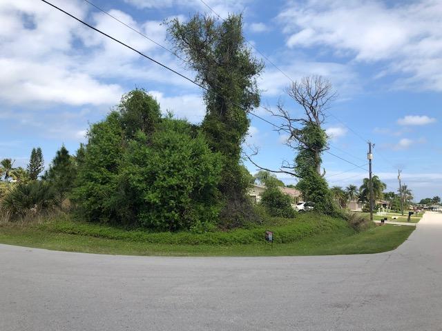 This is a .026 Corner lot in a family friendly community. Away from the main boulevard, yet close enough to US 1, Turnpike and I-95. Public's shopping center, Post Office, Park with Boat ramp to St Lucie River, St Lucie Botanical Gardens, and several restaurants are near-by. Come build your Dream Home on this large corner Lot on a quiet street.Can help you get with lot financing!