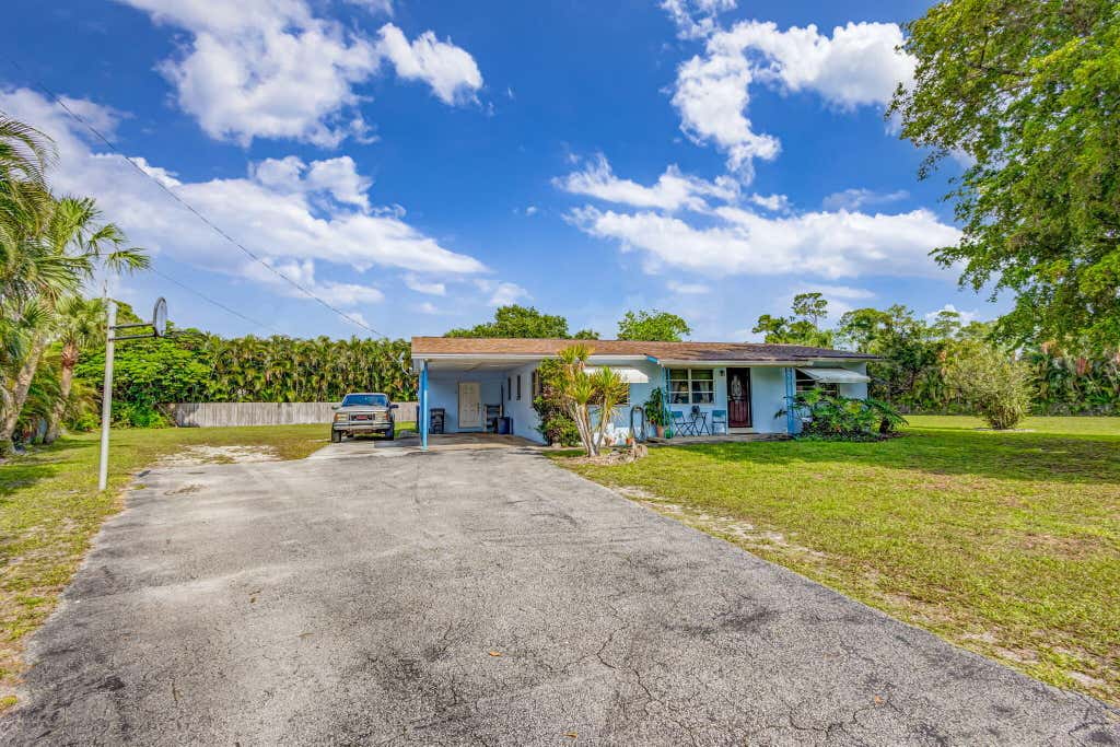 Photo of 8781 N Virgina Avenue, Palm Beach Gardens, FL 33418 (MLS # R11101346)