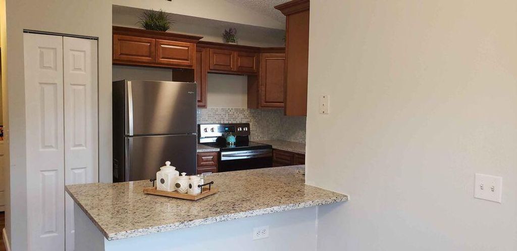 Photo of 2827 Stoneway Lane #C, Fort Pierce, FL 34982 (MLS # R11012248)