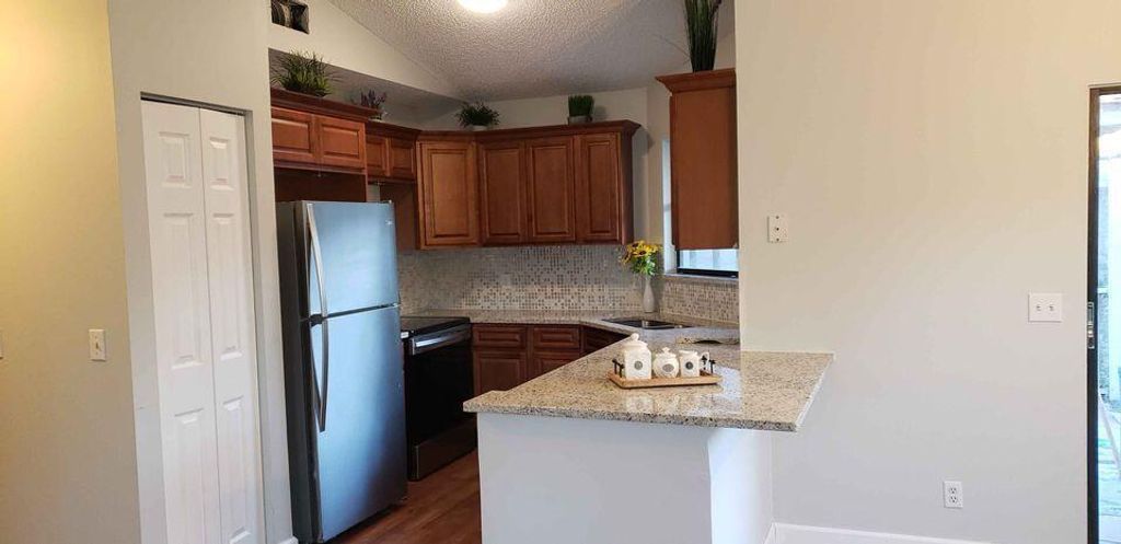 Photo of 2827 Stoneway Lane #C, Fort Pierce, FL 34982 (MLS # R11012248)