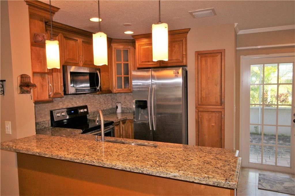 Photo of 7240 Woodmont Avenue #7240, Tamarac, FL 33321 (MLS # F10556583)