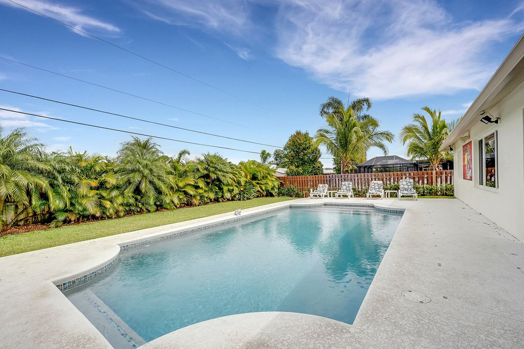 Photo of 543 SW Bailey Terrace, Port Saint Lucie, FL 34953 (MLS # R10966302)