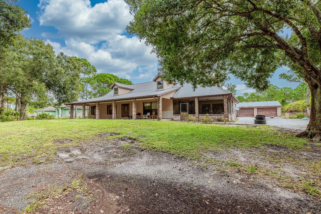 Photo of 4920 Tree Top Trail, Fort Pierce, FL 34951 (MLS # R11130638)