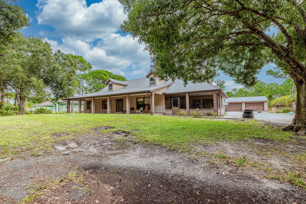 Photo of 4920 Tree Top Trail, Fort Pierce, FL 34951 (MLS # R11130638)