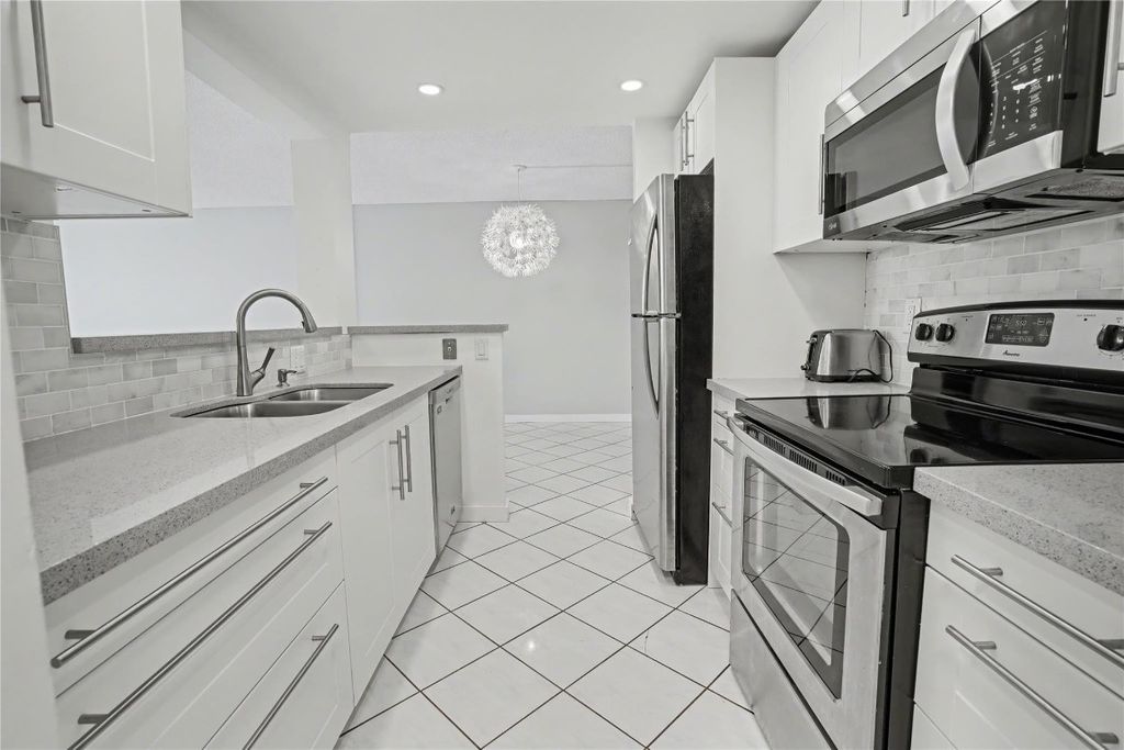 Photo of 1009 N Ocean Boulevard #110, Pompano Beach, FL 33062 (MLS # F10542064)