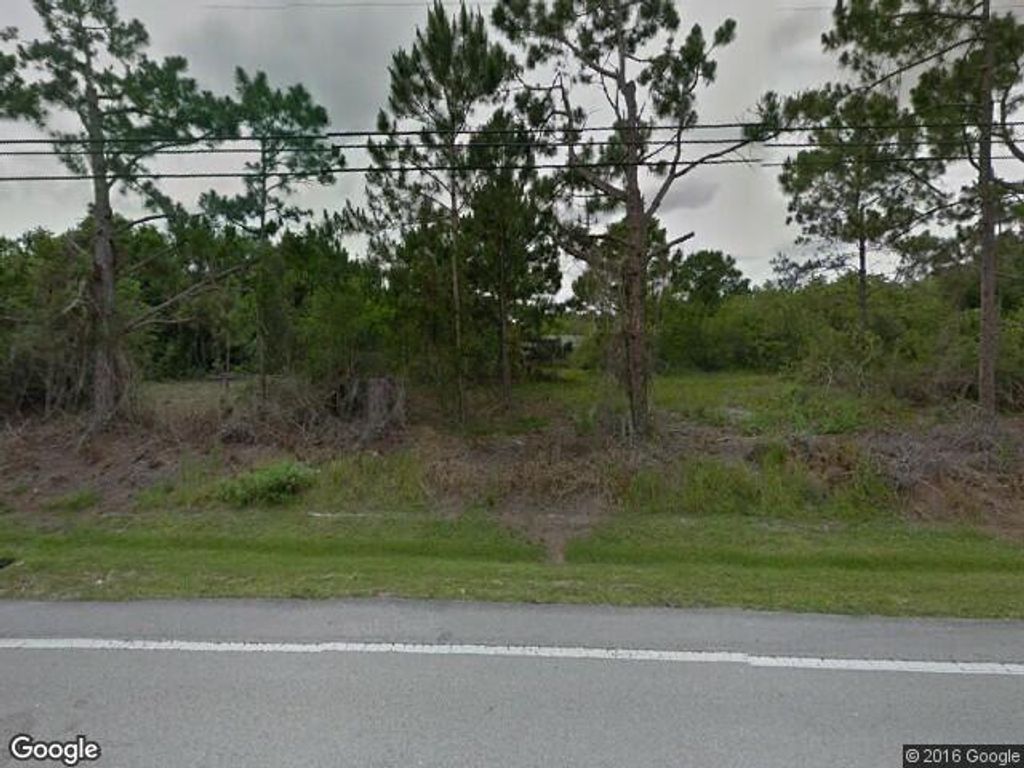 Photo of 3026 SW Port St Lucie Boulevard, Port Saint Lucie, FL 34953 (MLS # R11045223)