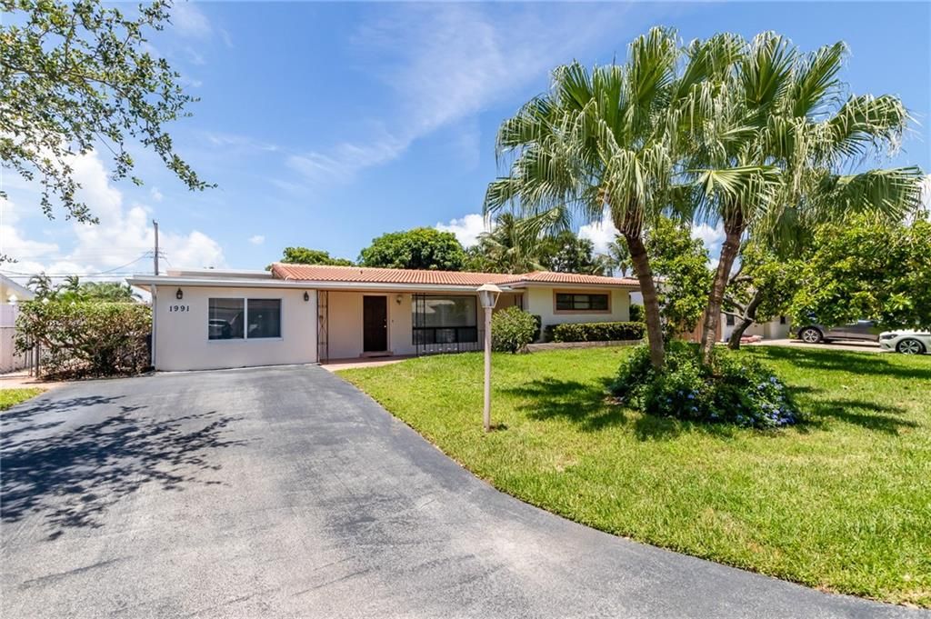Photo of 1991 NE 31st St, Lighthouse Point, FL 33064 (MLS # F10292998)