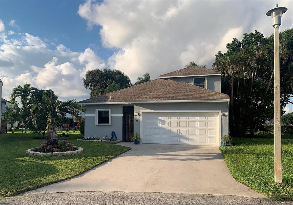 Wonderful 2 story 2 car garage. Lakefront home with 2 Master Suites ( 1 up & 1 down) & large walk-in closets. This home has it all! New Appliances ; Central Vacuum; Full size Washer/Dryer; Panel shutters . & an oversized screened patio overlooking lake. Unbelievable views from every room. Community pool, tennis & walking paths.