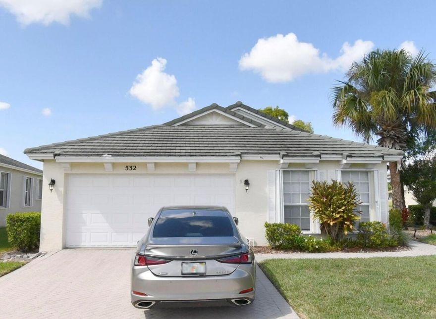 Live the dream! This beautiful 3-bed, 2-bath where every day feels like a vacation. You'll love the gorgeous kitchen, open concept floor plan. Primary Suite features, large laundry room and garage storage. Enjoy your coffee or BBQ on the big yard with lake view. Prime location near Turnpike, I-95, dining, shopping, and beaches. Schedule your showing today. plenty of space to park your yacht or your truck. Easy to Show!!!