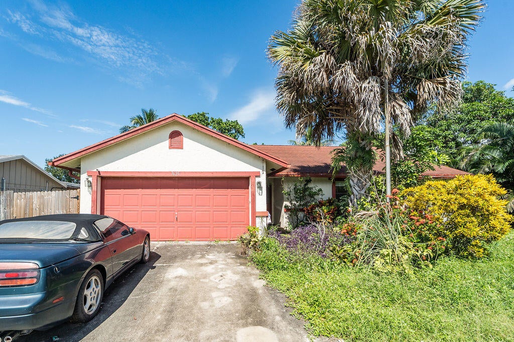 Photo of 7625 CANAL Drive, Lake Worth, FL 33467 (MLS # B26087739)
