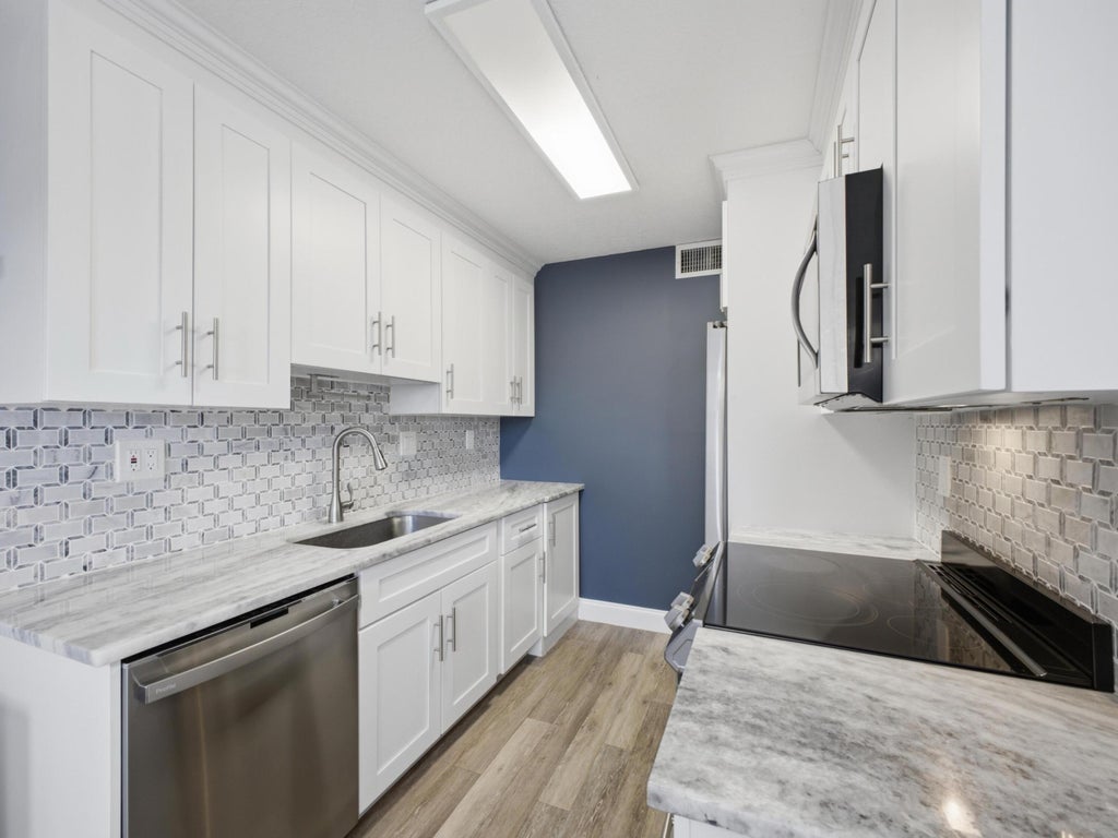 Photo of 3038 GUILDFORD C #3038, Boca Raton, FL 33434 (MLS # B26069646)