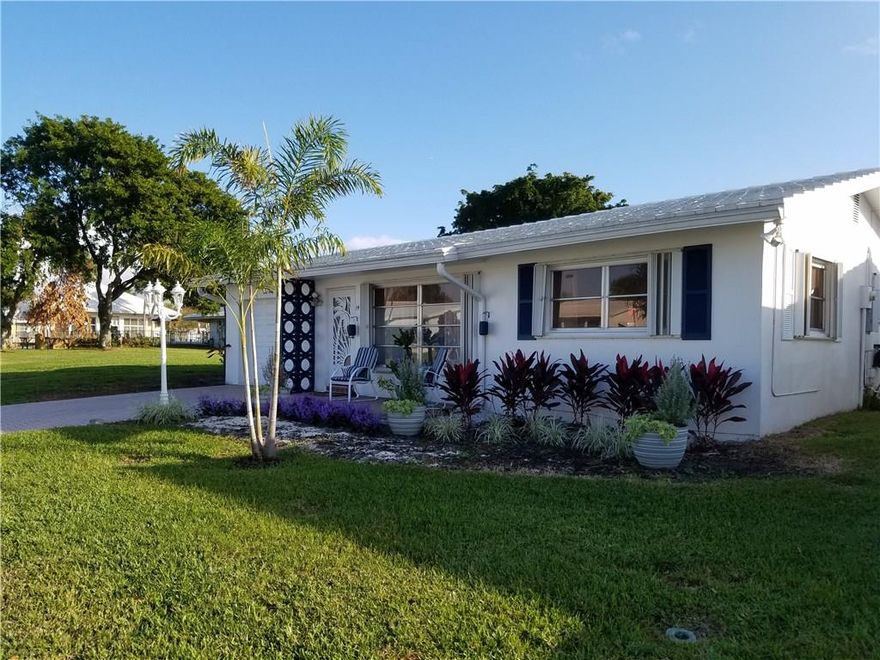 MUST SEE!! This is the one you were looking for!! Amazing 2 bedroom,1 bath, 1 car garage home, this is the nicest house in the community, completely renovated, new kitchen & bath with quartz counter tops, tile flooring, extremely bright with lots of natural light thought out, open floor plan, paver driveway and patio, amazing location, lots of privacy next to the pool, appliances 1 year old, 2 refrigerators and 1 stand up freezer, Leisureville 55+ community, great location you will love living here!!