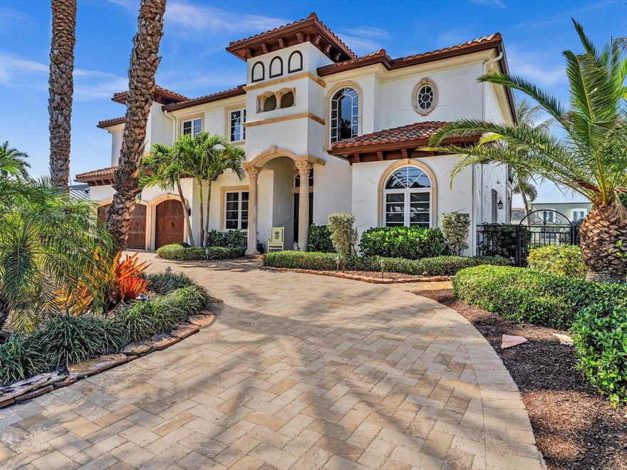 Experience luxury waterfront living in the coveted Lighthouse Point community with this custom estate offering seller financing at excellent rates for qualified buyers. Boasting over 90 feet of dockage on a deep canal with no fixed bridges, this boater’s paradise is just minutes from Hillsboro and Boca Inlets. The home features 7 bedrooms, 4.1 baths, two laundry rooms, a walk-in pantry, and abundant storage, all enhanced by elegant architectural details and smart home upgrades including Wi-Fi-controlled security cameras, A/C, and sprinkler system. The expansive primary suite includes dual walk-in closets and opens to a spacious patio perfect for enjoying Florida’s stunning sunsets, while the driveway and pool deck are finished with beautiful travertine pavers.