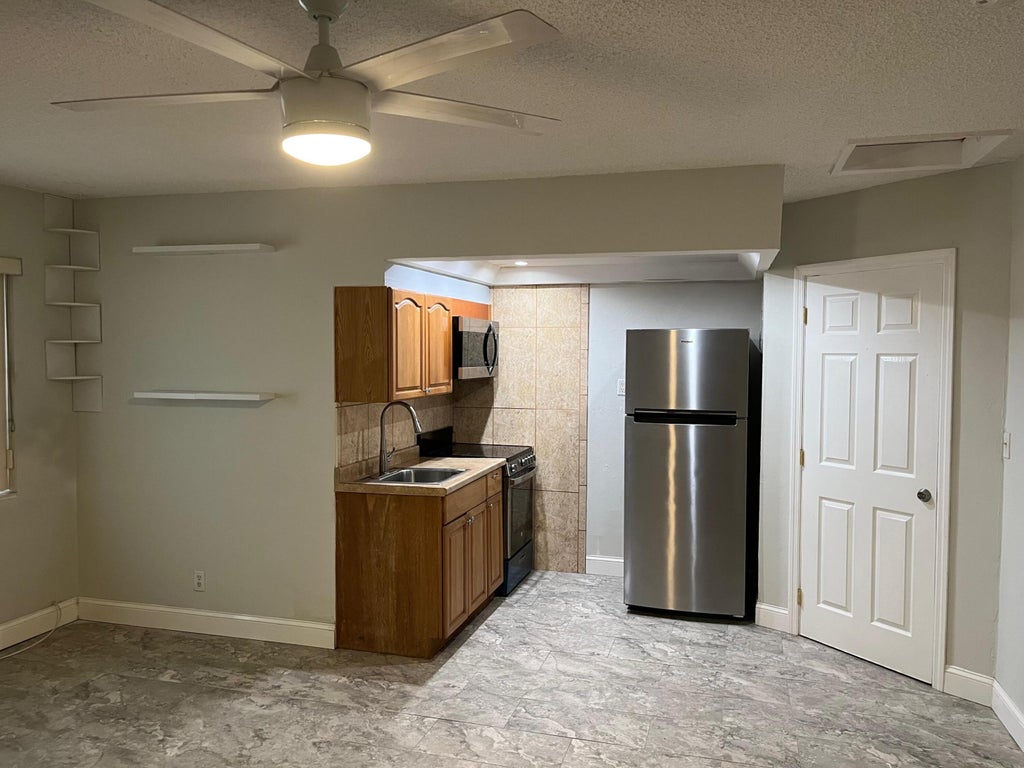 Photo of 3049 NE 20th Terrace, Fort Lauderdale, FL 33306 (MLS # B26044734)