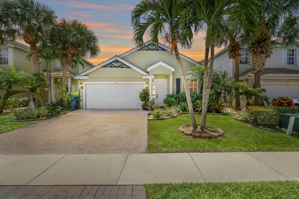 Photo of 142 Canterbury Place, Royal Palm Beach, FL 33414 (MLS # R10790017)