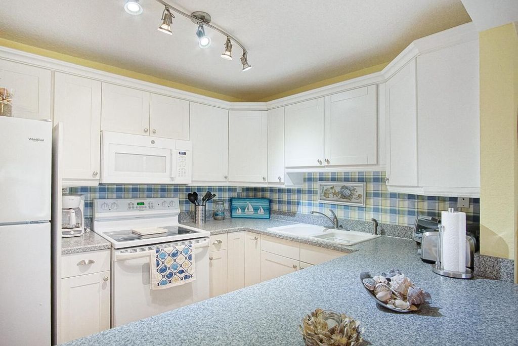 Photo of 2400 S Ocean Drive #412, Fort Pierce, FL 34949 (MLS # R10965061)