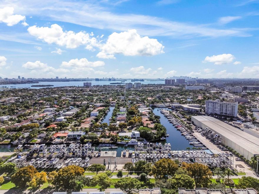 **50K CREDIT to BUYER for PREPAID BOAT STORAGE** at either Arch Creek Marina or TNT Marina which are within walking distance of the Townhouse. Embody L'Art de Vivre motto (savoring life's simple pleasures) in this Zen-like 2,481 square-foot, 4 Bd/3Ba with a Preserve in own Backyard.  -- Virtually Staged-- FEATURES & AMMENITIES: Open Floor Plan, High Ceilings, Large Kitchen, Stainless Steel Appliances, Walk-In Closets, EV Charger, Nature Preserve, Marina Within Walking Distance Shopping Nearby  LOCATION:  Within walking distance to Keystone Point Marina or TNT Marine Center with fuel dock on the Little Arch Creek Canal.   Within walking distance to Arch Creek Environmental Preserve (dogs allowed) Amenities o Bike Trail o Butterfly Garden o Nature Preserve o Walking Path  Within walking distance to Enchanted Forest Elaine Gordon Park Amenities o Butterfly Garden o Community Garden o Grill Stations o Horse Stables & Petting Zoo - Managed by MM Equestrian o Little Library o Nature Center o Nature Preserve o Pavilions o Tot-Lot o Walking Path  15 minutes to Oleta River State Park  Amenities o Bicycling o Camping, primitive group camping area is available for organized youth groups ages 18 and under. One chaperone is required for every 10 youth campers. o Canoeing, Kayaking and Paddle Boarding  o Fishing o Mountain biking o Picnicking o Roller Blading o Swimming and Snorkeling off Biscayne Bay in our saltwater lagoon 28 min to Miami International Airport & 33 min Ft. Lauderdale International Airport  15 min to I95 (Downtown & South Beach!)  BEACHES 10-15 minutes to Surfside Beach - Known for being a quieter, beach with soft white sand and a walking/biking trail nearby   15 minutes to Haulover Beach - State's most popular clothing-optional beach  UNIVERSITIES o Florida International University 12 min -  o Barry University 15 min -  o Johnson & Wales University 6 min   SUPERMARKETS/PHARMACIES o Costco 11 min -  o CVS 7 min  o Publix 6 min -  o Walgreens 6 min -  o Whole Foods 7 min -   MALLS  o Aventura Mall 19 min -   o Bal Harbor Shops 10 min   HOSPITALS o Aventura Hospital 20 min -  o Mount Sinai Hospital 8 min   GYM o LA Fitness 5 min -  o Elevation Fitness 7 min