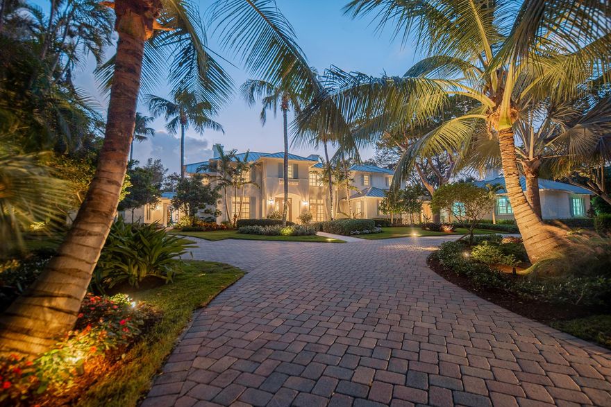 Welcome to your dream riverfront estate in the charming Town of Sewall's Point. Spanning 1.76 acres and set on a rare high coral rock bluff, this magnificent property is located outside the flood zone and boasts 200 feet of prime water frontage. Offering deep-water dockage with quick, bridge-free ocean access, a private white sand beach, and lush native landscaping with mature trees and vibrant blooms, this estate is a sanctuary of natural beauty and luxury. Take in breathtaking river views from the infinity-edge pool, or entertain in style with meticulously crafted built-ins, a gourmet kitchen, and a butler's pantry. A private elevator leads to the spacious master suite, complete with a secluded balcony overlooking the pool and river.