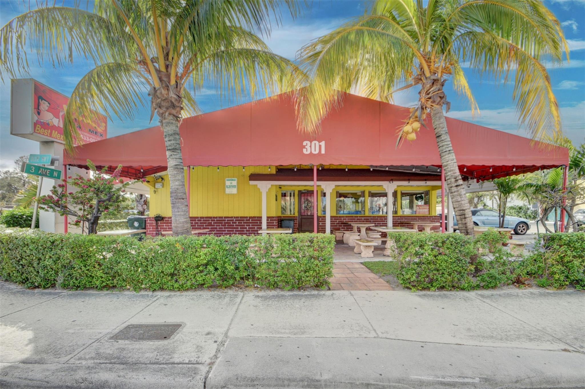 Situated on a generous .35-acre lot, this property features a spacious freestanding building 3,464 square feet, currently a restaurant. Lease is set to expire April 2025.
Strategically located on Dixie Hwy, the property boasts excellent visibility with approximately 22,500 daily vehicle impressions. Convenient access is provided entry point between 6th and 10th Ave, intersecting with US-1 just to the south.
The surrounding area is characterized by a vibrant commercial landscape, with prominent neighbors including a Publix and Burger King. Research shows that residents of this area frequently visit Quick Service Restaurants as they cater to their preferences. Investors with QSR contacts can explore net ground lease opportunities, providing flexibility in maximizing returns.