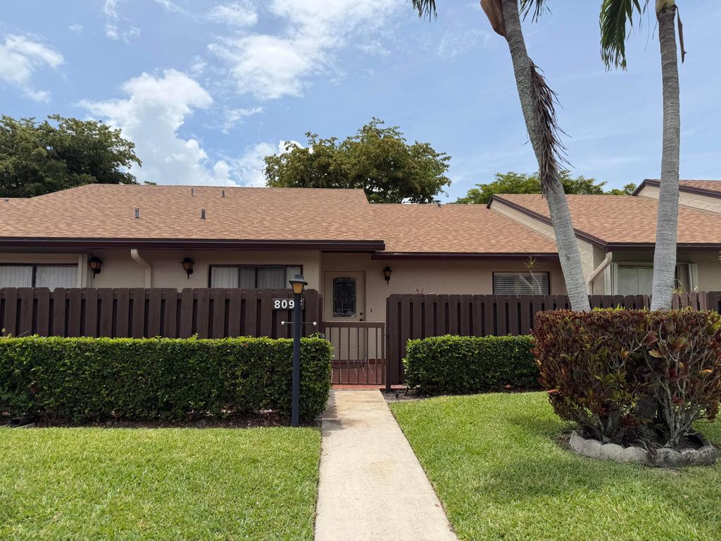 Photo of 809 Sky Pine Way #F, Greenacres, FL 33415 (MLS # B26027024)