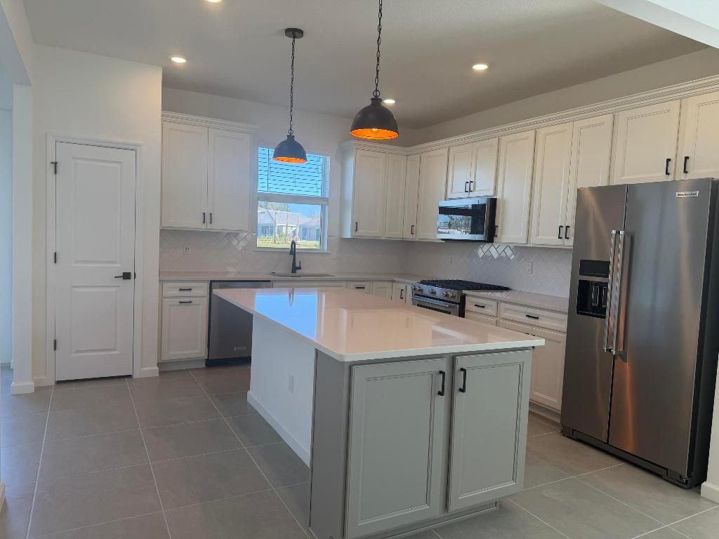 Photo of 4450 Pinafore Street, Vero Beach, FL 32967 (MLS # R11153428)