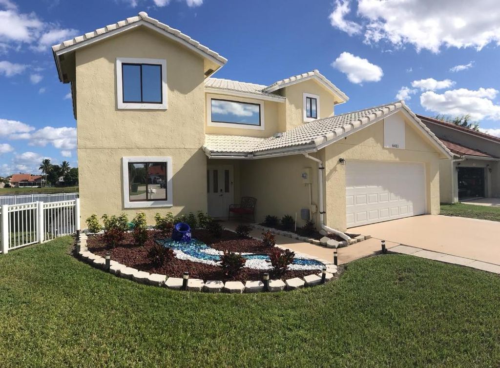 Photo of 6411 96th Place S, Boynton Beach, FL 33437 (MLS # R11153386)