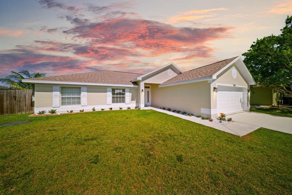 Photo of 3227 SW Foremost Drive, Port Saint Lucie, FL 34953 (MLS # R11090158)