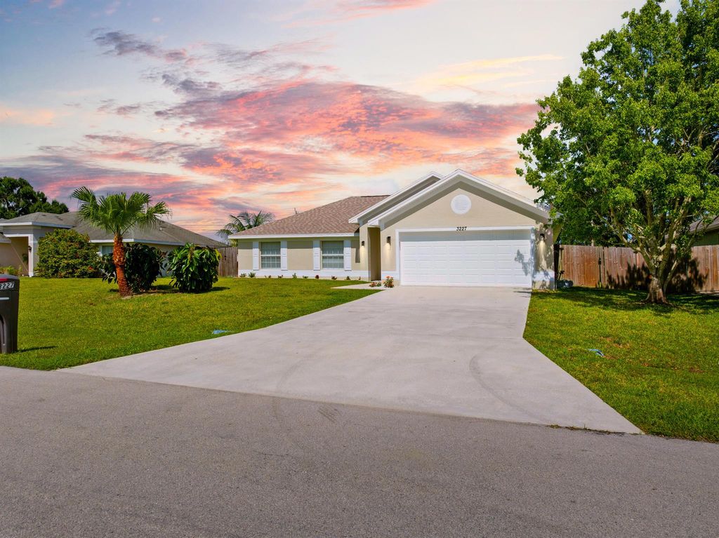 Photo of 3227 SW Foremost Drive, Port Saint Lucie, FL 34953 (MLS # R11090158)