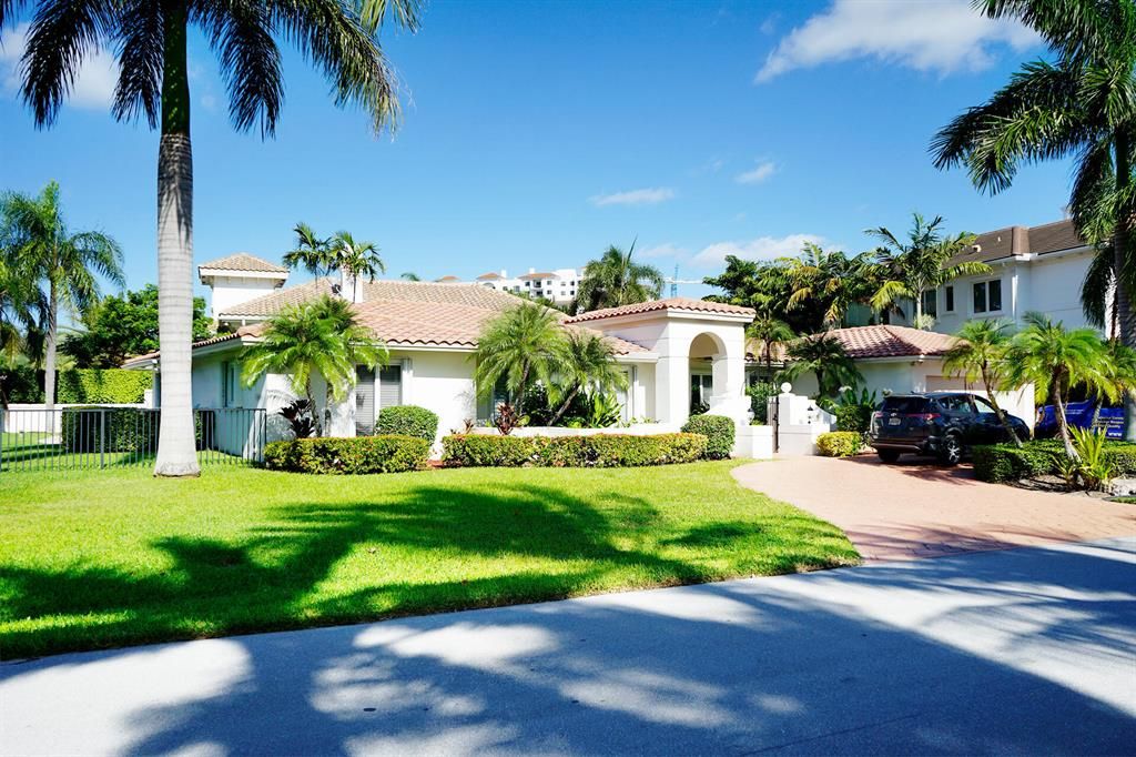 Photo of 1251 Thatch Palm Drive, Boca Raton, FL 33432 (MLS # R10779309)