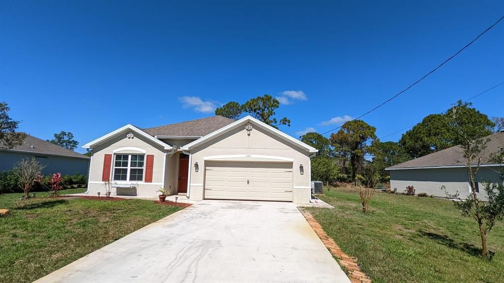 Photo of 365 SW Dagget Avenue SW, Port Saint Lucie, FL 34953 (MLS # R10779785)