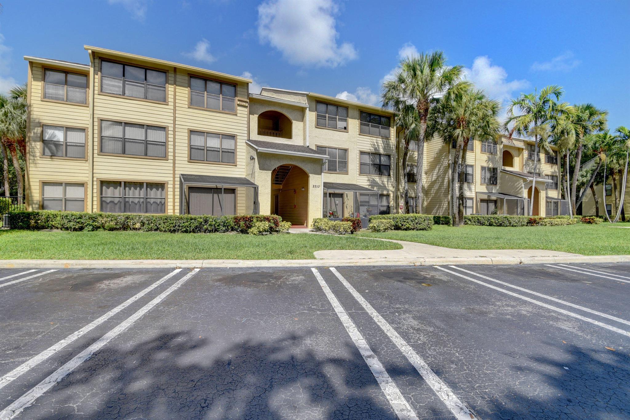 Abundantly Charming and Updated Condo with Lake Views! Nestled in the amenity-rich and desirable gated community of Boynton Landings, this 1BR/1BA, 887sqft home welcomes with an open floorplan, durable tile flooring, a neutral color scheme, vaulted ceilings, a spacious living room, and an upgraded kitchen featuring new white shaker cabinetry and new quartz countertops. Marvelously designed, the sizeable bedroom has a large closet, a ceiling fan, and faux wood flooring, while the full bathroom includes a storage vanity and a shower/tub combo. Other features: available parking, in-unit W/D, bonus den/office, community swimming pool, gym, basketball court, and BBQ area, only 5-minutes from the beach, near shopping, restaurants, Boynton Beach Mall, and schools, and so much more! Come See Now!