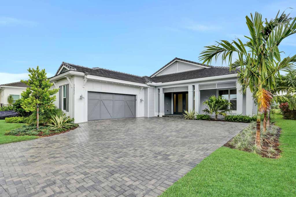 Photo of 9992 Seagrass Way, Palm Beach Gardens, FL 33412 (MLS # R10992467)
