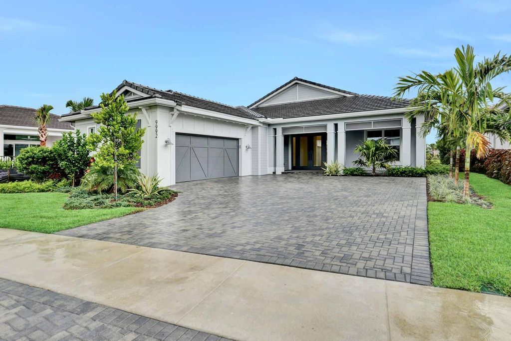 Photo of 9992 Seagrass Way, Palm Beach Gardens, FL 33412 (MLS # R10992467)