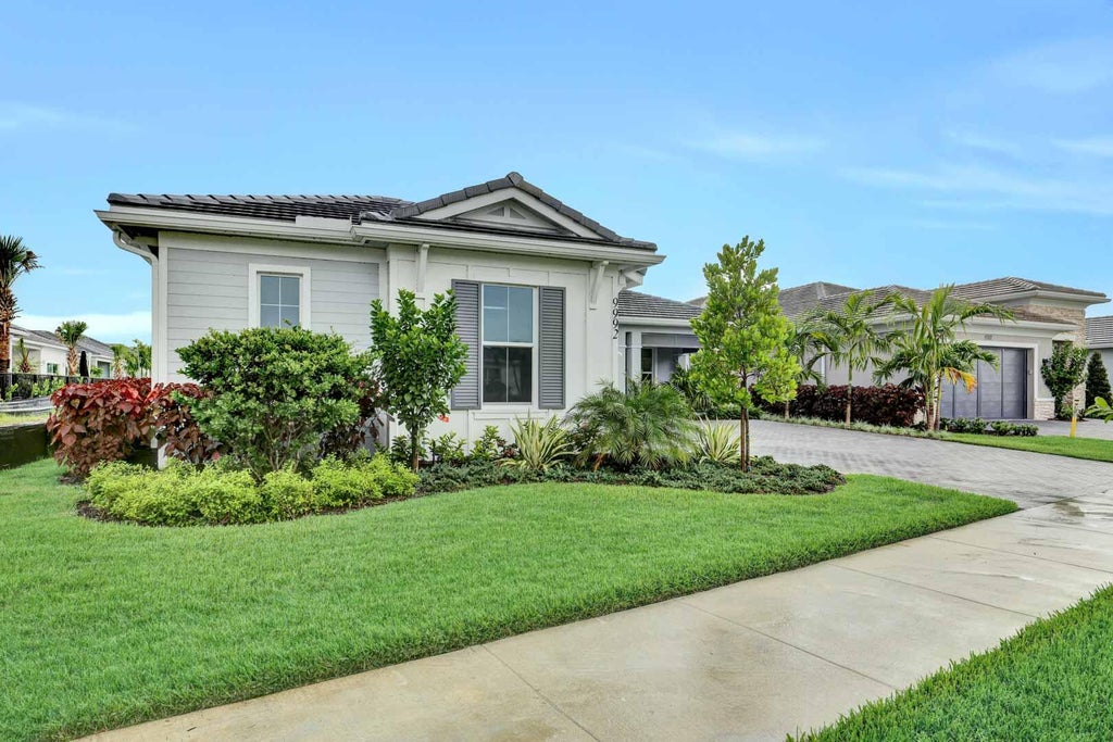 Photo of 9992 Seagrass Way, Palm Beach Gardens, FL 33412 (MLS # R10992467)